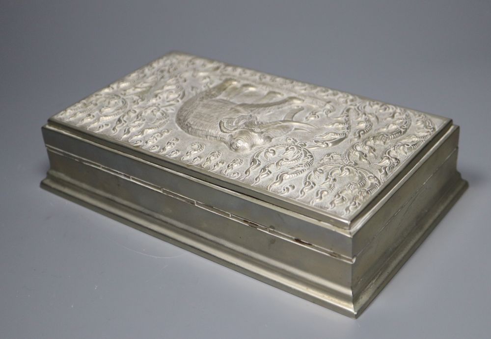 Two silver cigarette boxes, a silver cigarette case and Thai white metal cigarette box, largest 18.7cm.